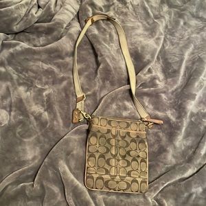 Coach small purse over the shoulder- medium worn